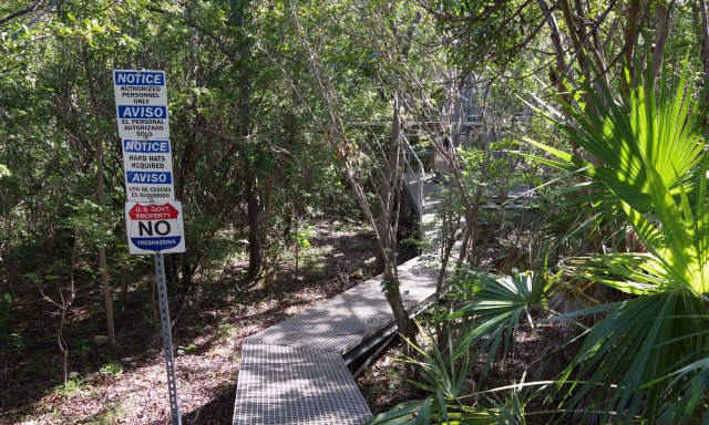 Boardwalk at a NEON site with site access signs