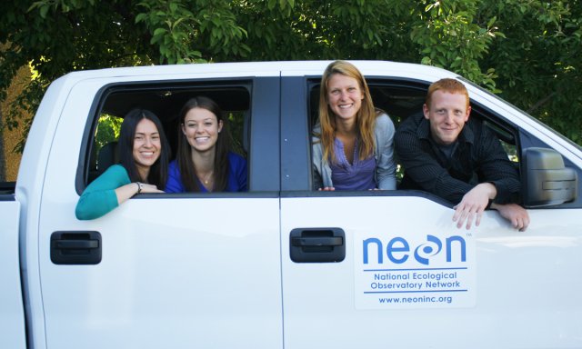 Group of NEON field staff in a field truck