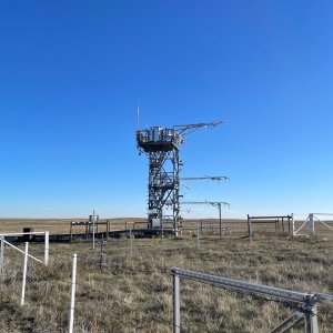 The CPER field site flux tower with a sunny blue sky