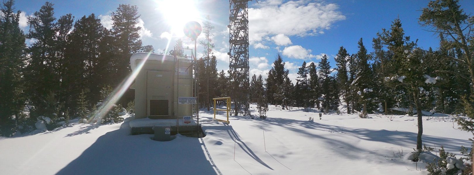 Tower and instrument hut in the snow at Yellowstone