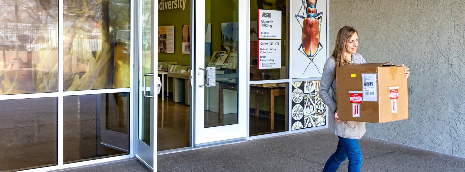 Photo of person outside of the Biorepository facility