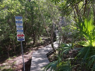 Boardwalk at a NEON site with site access signs