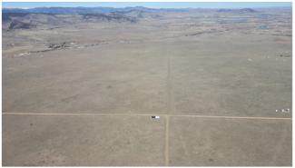 Figure 4 - Routine Vicarious Calibration Flight over Table Mountain, Boulder, CO showing two calibration tarps 