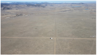 Figure 4 - Routine Vicarious Calibration Flight over Table Mountain, Boulder, CO showing two calibration tarps