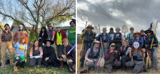 Field technicians in Halloween costumes