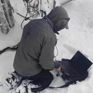 Field tech in the snow