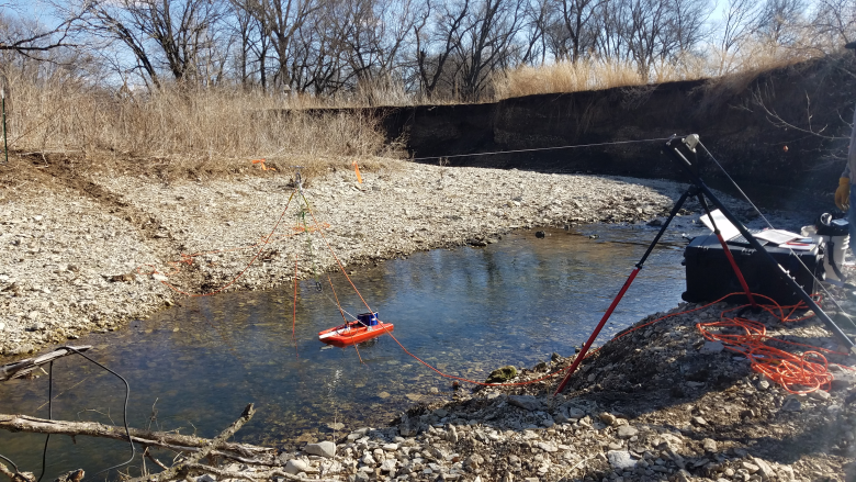 A Trimaran float equipped with an ADCP measuring discharge at the D06 MCDI stream site.