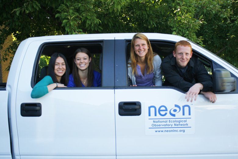 Group of NEON field staff in a field truck